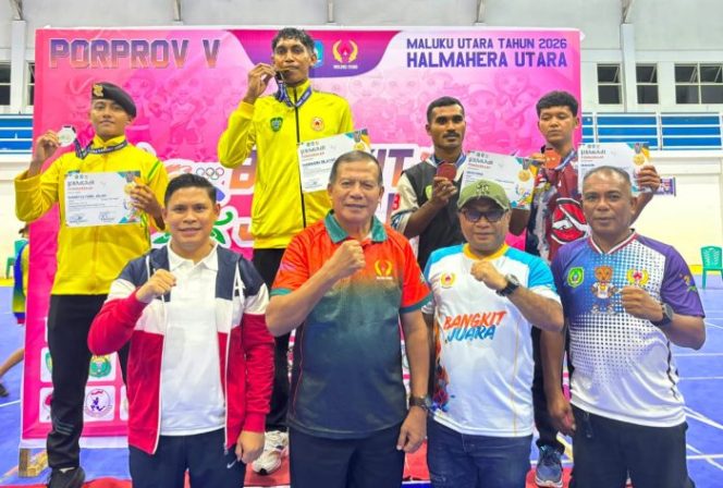 
					Harnudin Silayar, sukses mempersembahkan medali emas setelah tampil luar biasa di kelas 70 kilogram putra